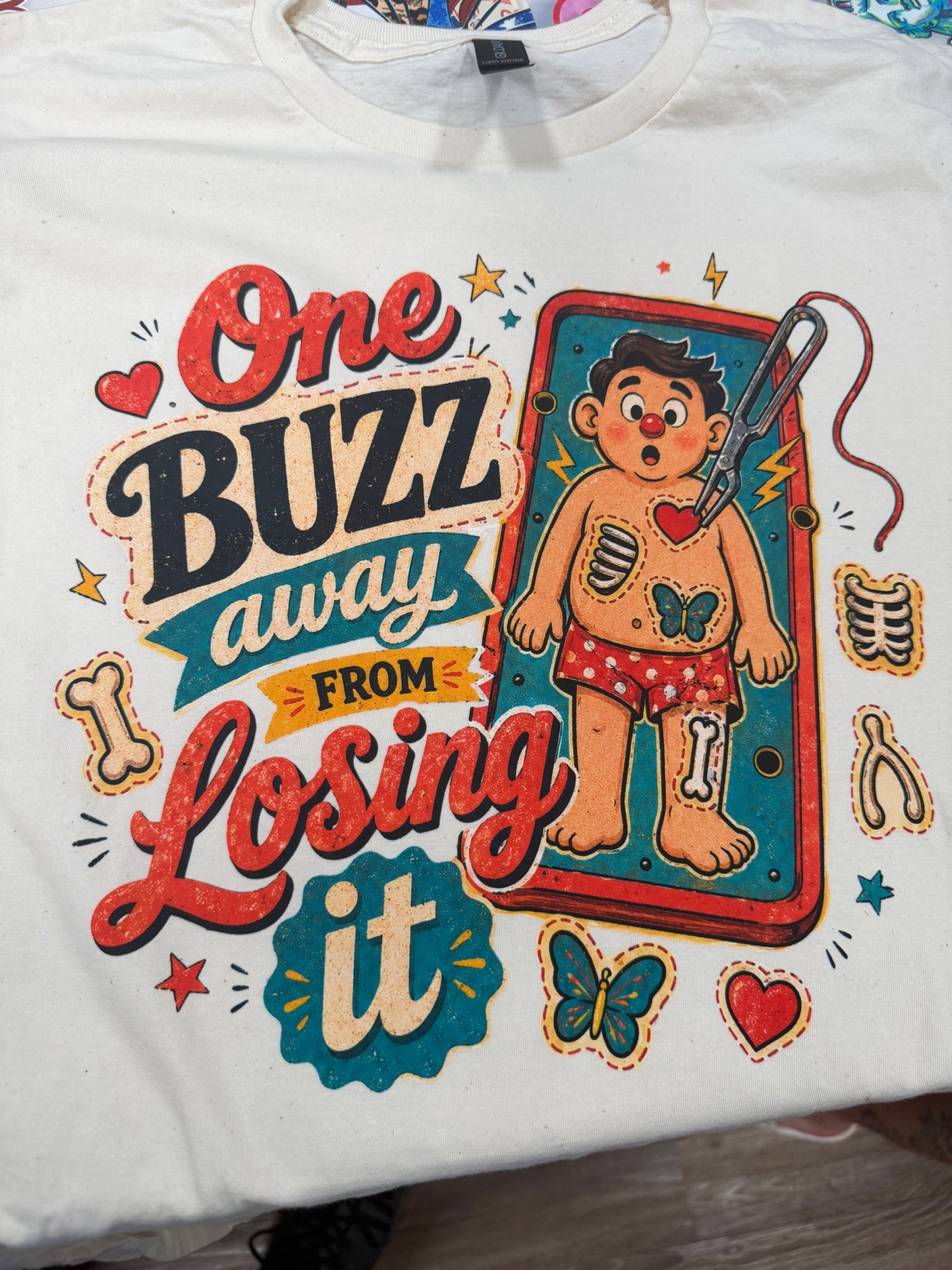One buzz away from losing it Unisex T-Shirt
