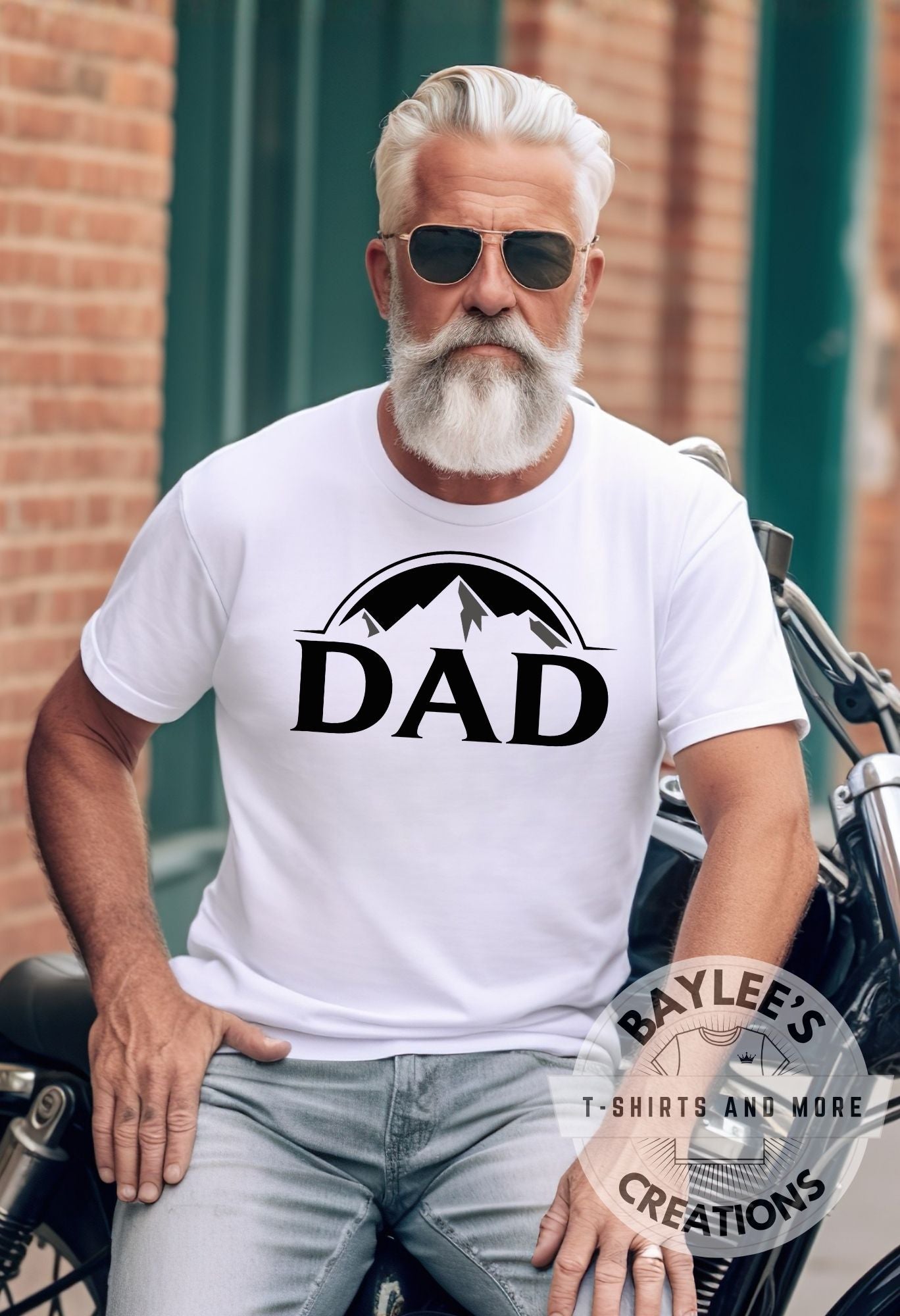 Man wearing a white t-shirt with 'DAD' printed on it, sitting on a motorcycle.